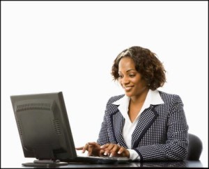 black business woman at laptop